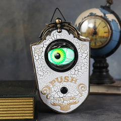 One-Eyed Glowing Halloween Doorbell.  How inviting.